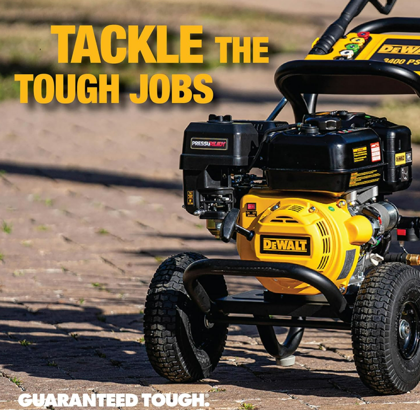 DeWalt gas pressure washer on paver driveway showing compact form factor